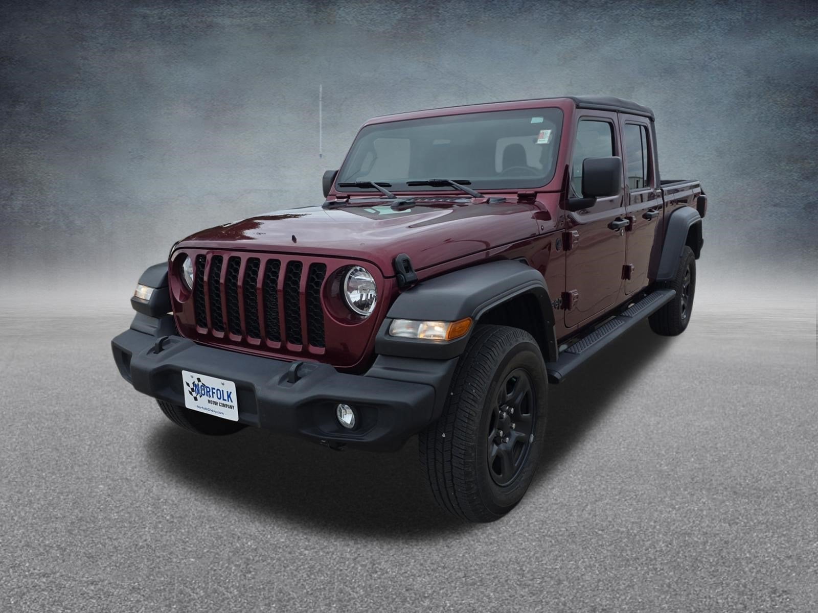 2021 Jeep Gladiator Sport 4x4 in Red — front three-quarter view