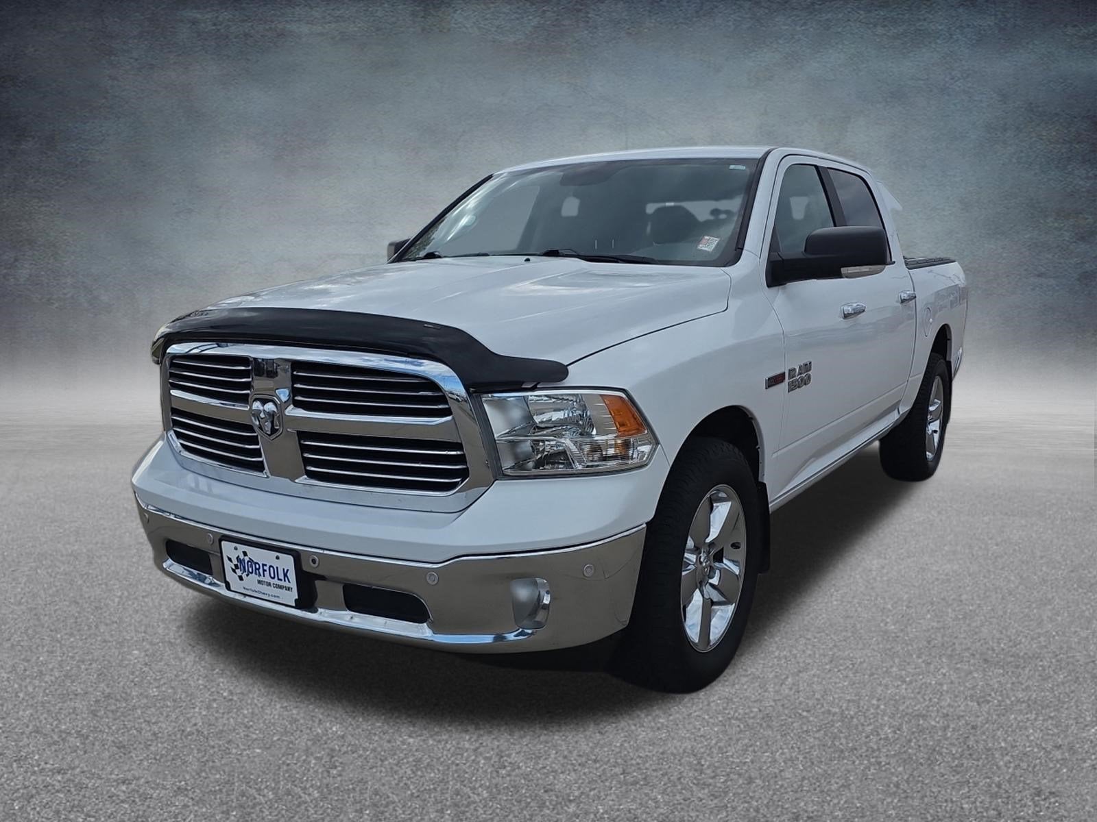 2017 RAM 1500 Big Horn Crew Cab 4x4 5'7" Box in White — front three-quarter view