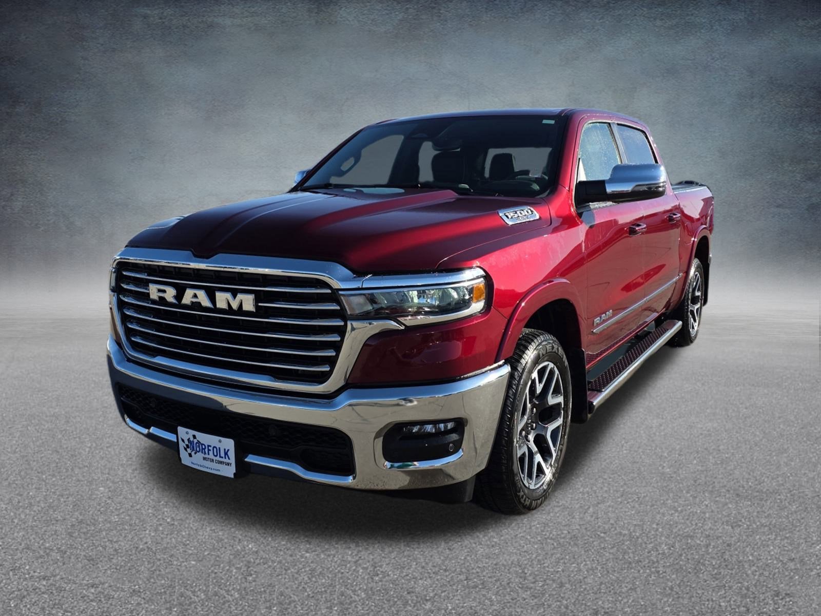 2025 RAM 1500 Laramie Crew Cab 4x4 5'7" Box in Red — front three-quarter view