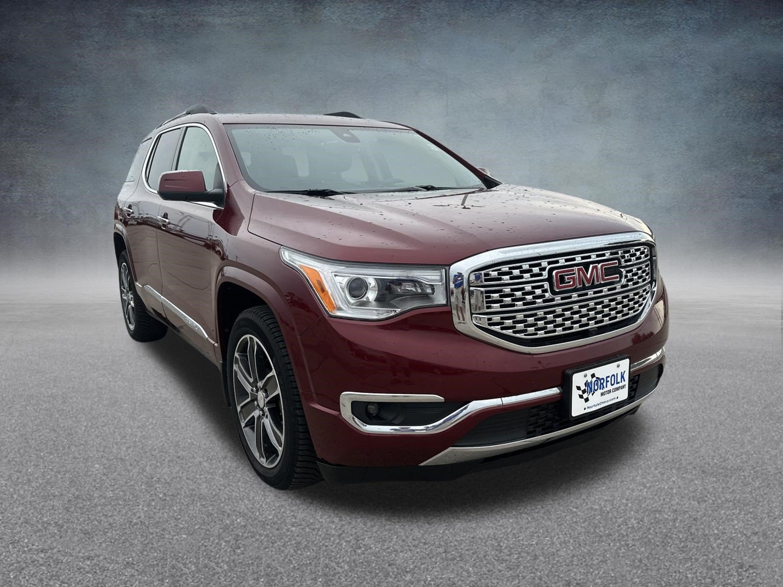 2017 GMC Acadia — rear three-quarter view