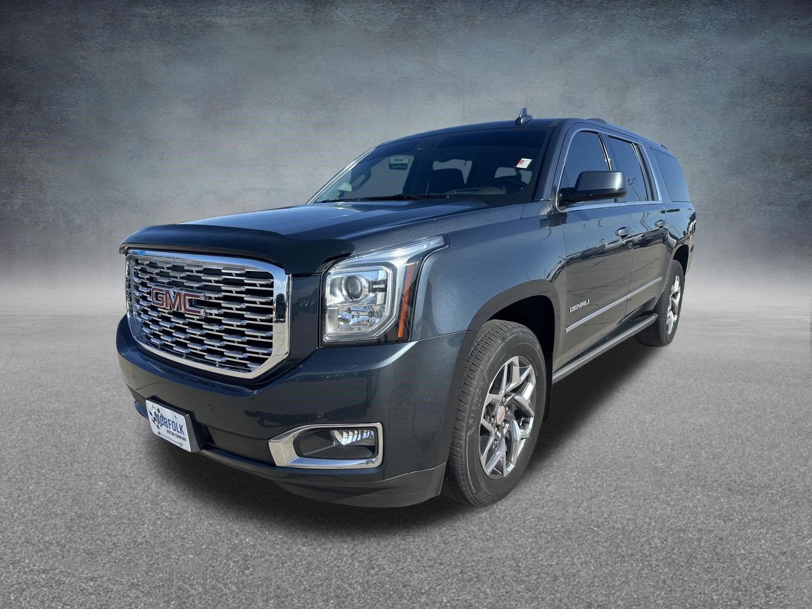 2019 GMC Yukon XL Denali in Dark Sky Metallic — front three-quarter view