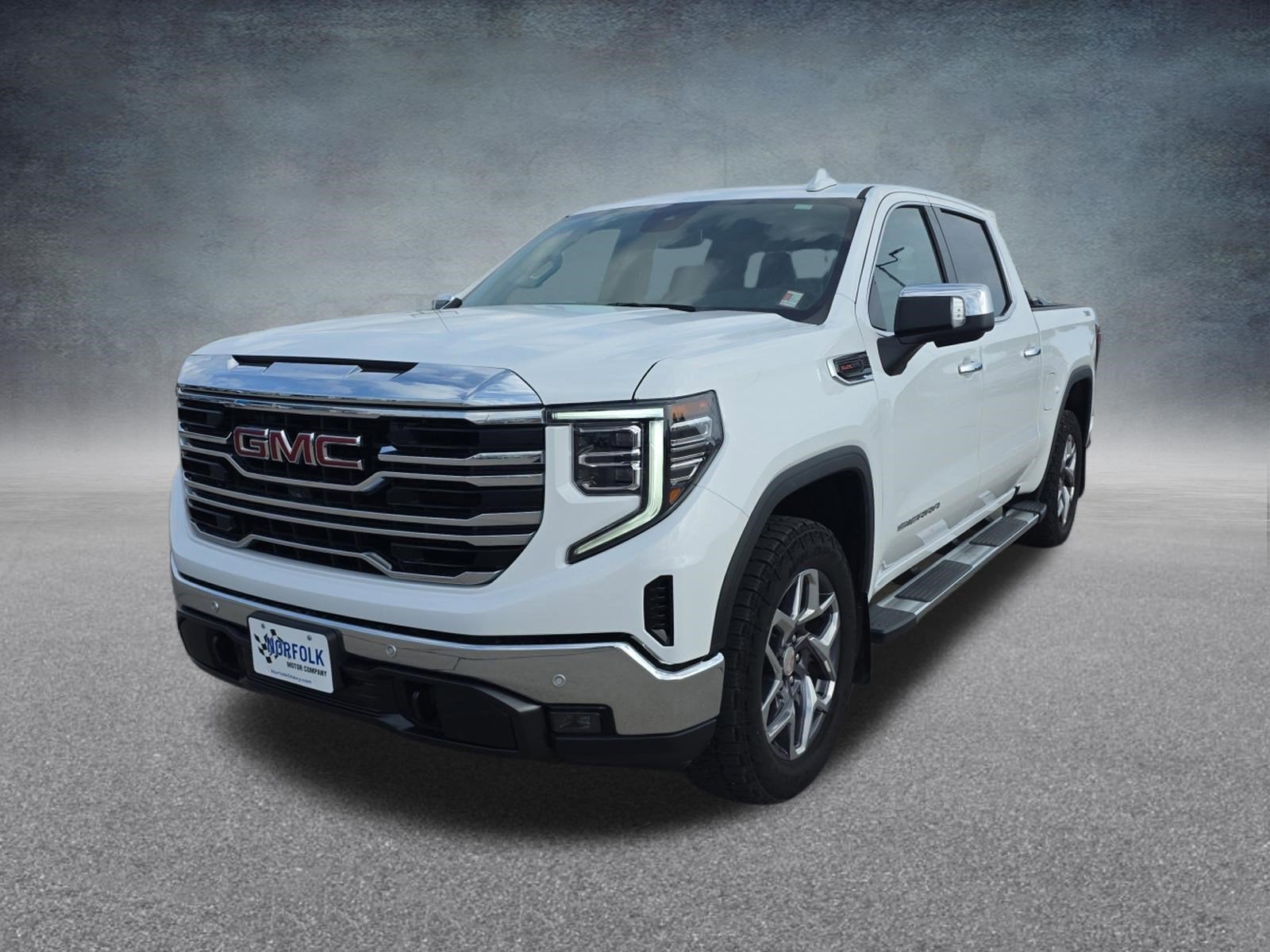 2023 GMC Sierra 1500 SLT in Summit White — front three-quarter view