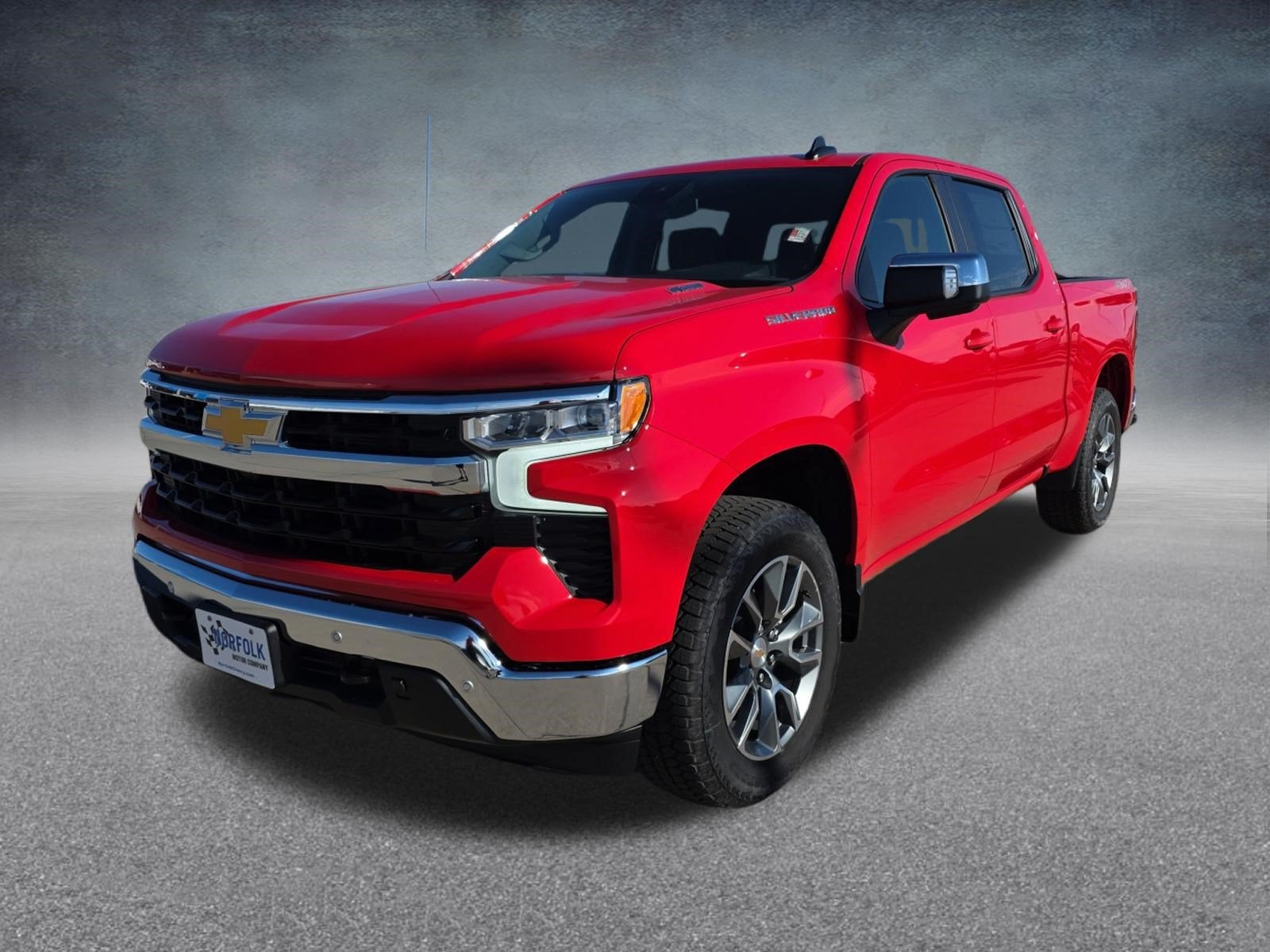 2026 Chevrolet Silverado 1500 LT in Red Hot — front three-quarter view