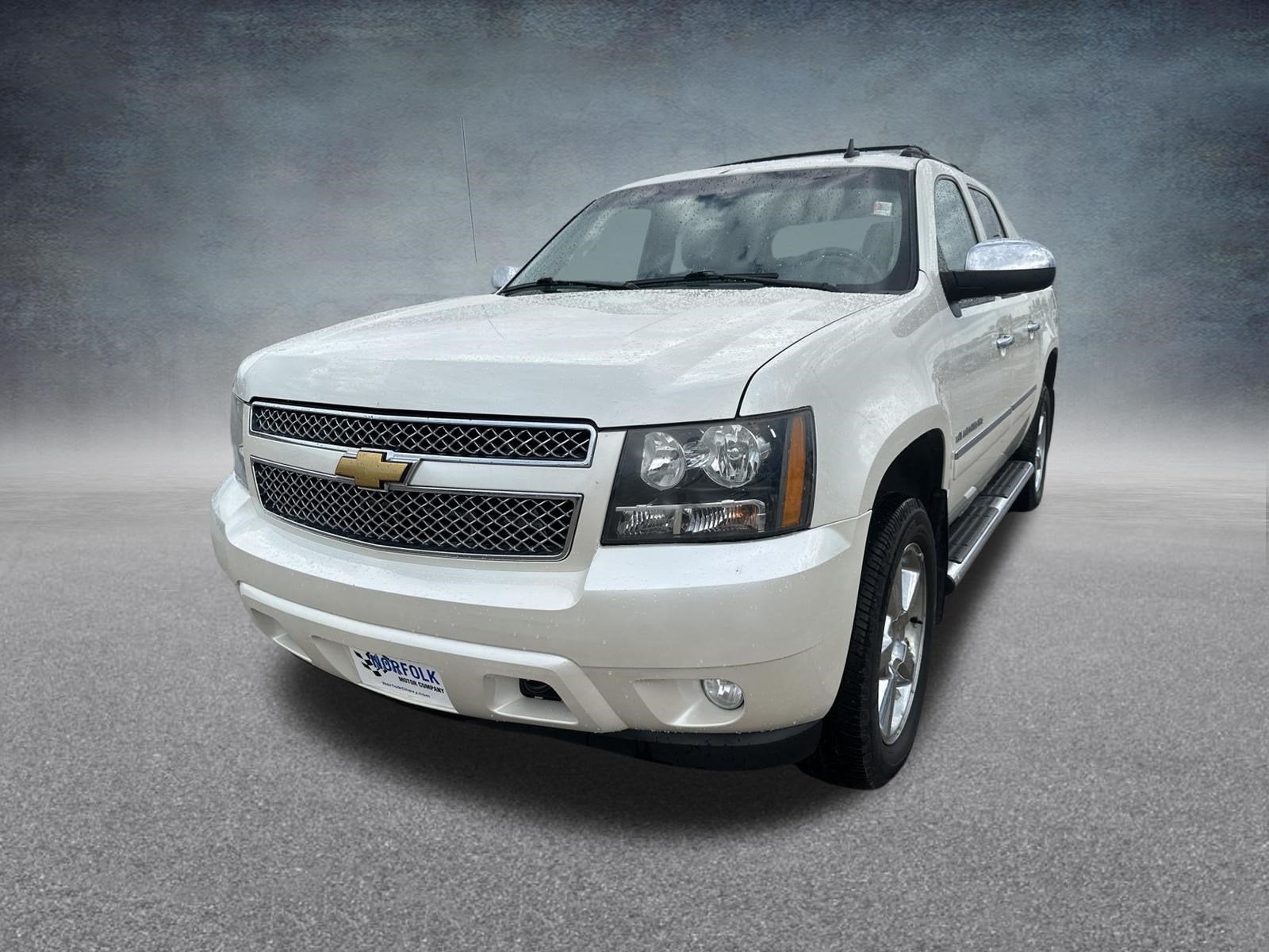 2013 Chevrolet Avalanche LTZ in White Diamond Tricoat — front three-quarter view